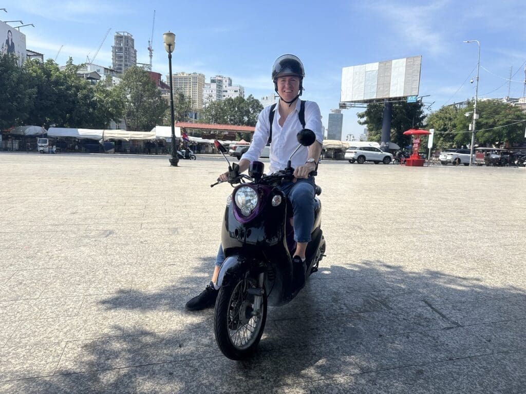 Ladislas on a scooter exploring the opportunities for investing in Phnom Penh Real Estate market