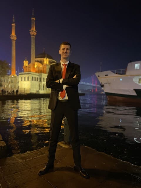 Ladislas Maurice in Besiktas Istanbul in front of Mosque exploring Istanbul real estate market