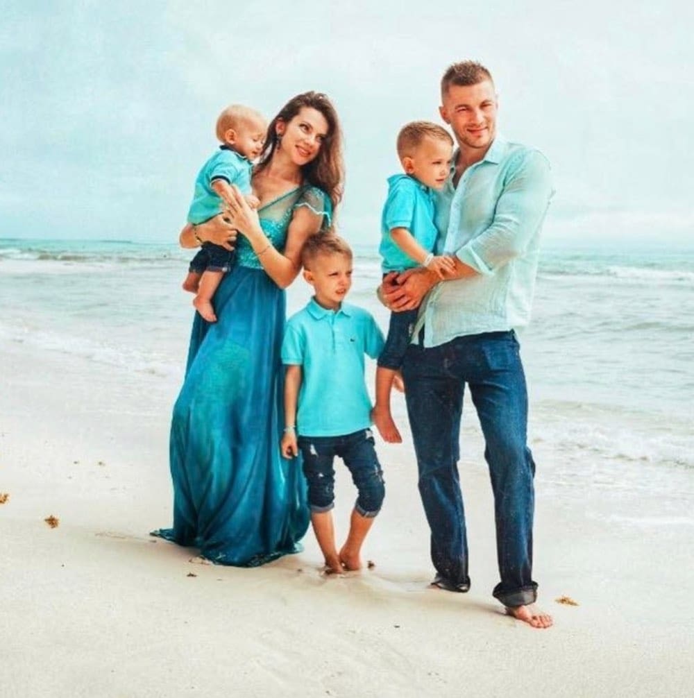Sergie and his family on the beach in Mexico